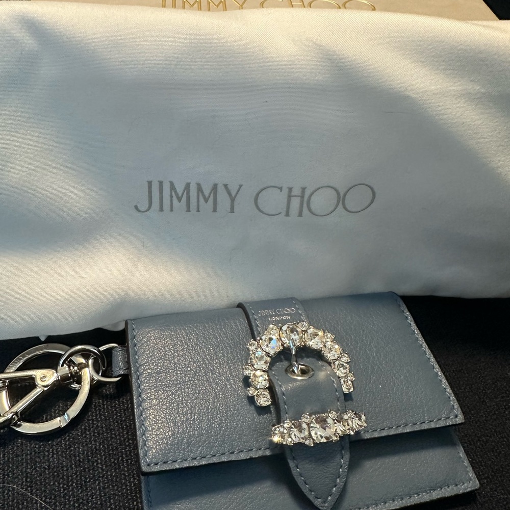 New in box jimmy choo cheri swarovski crystal charm case in parrot